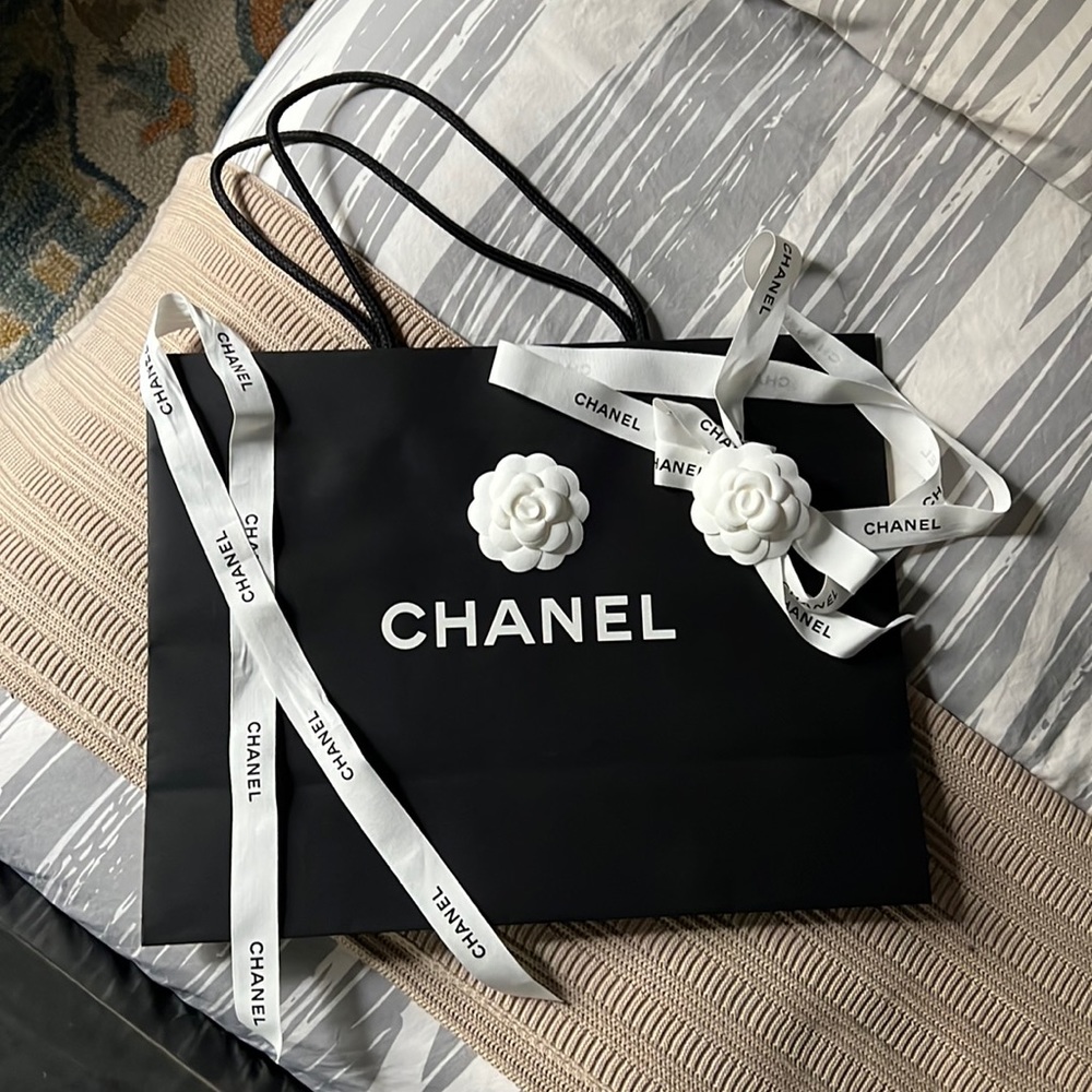 Chanel shopping bag with Camellia, ribbon, and box ribbon with Camellia
